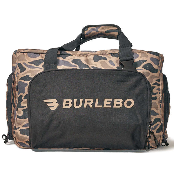 Front view of BURLEBO camo cooler bag with black zippered front pocket, logo detail, dual top handles, and side storage compartments.