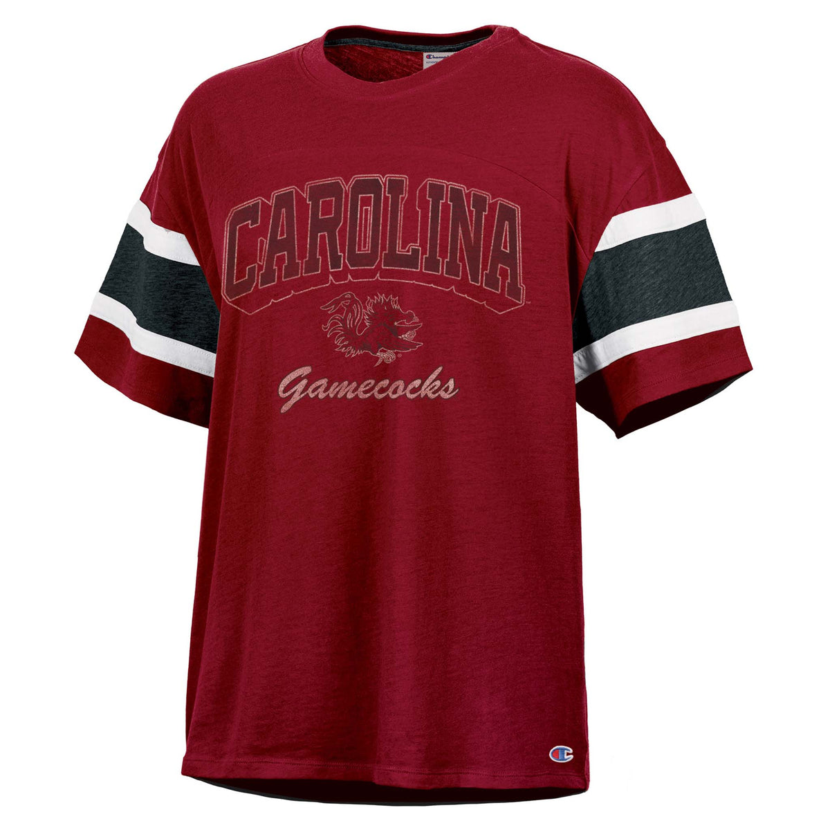 Women's garnet red Carolina Gamecocks t-shirt with "CAROLINA" text and gamecock logo on chest, featuring black and white striped sleeves and Champion logo