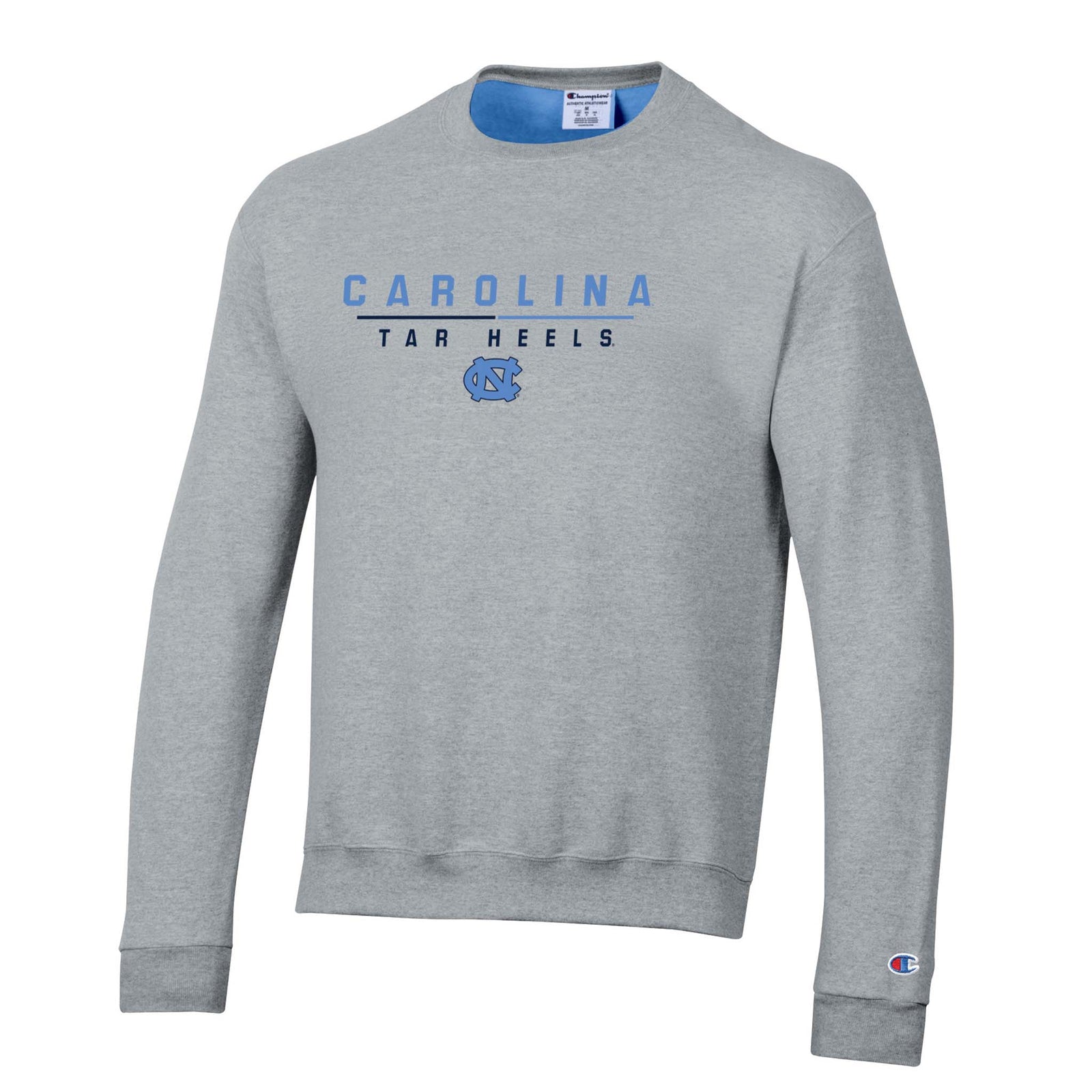 Grey Champion crewneck sweatshirt with “Carolina Tar Heels” text and NC logo in Carolina blue, finished with Champion “C” logo on sleeve.