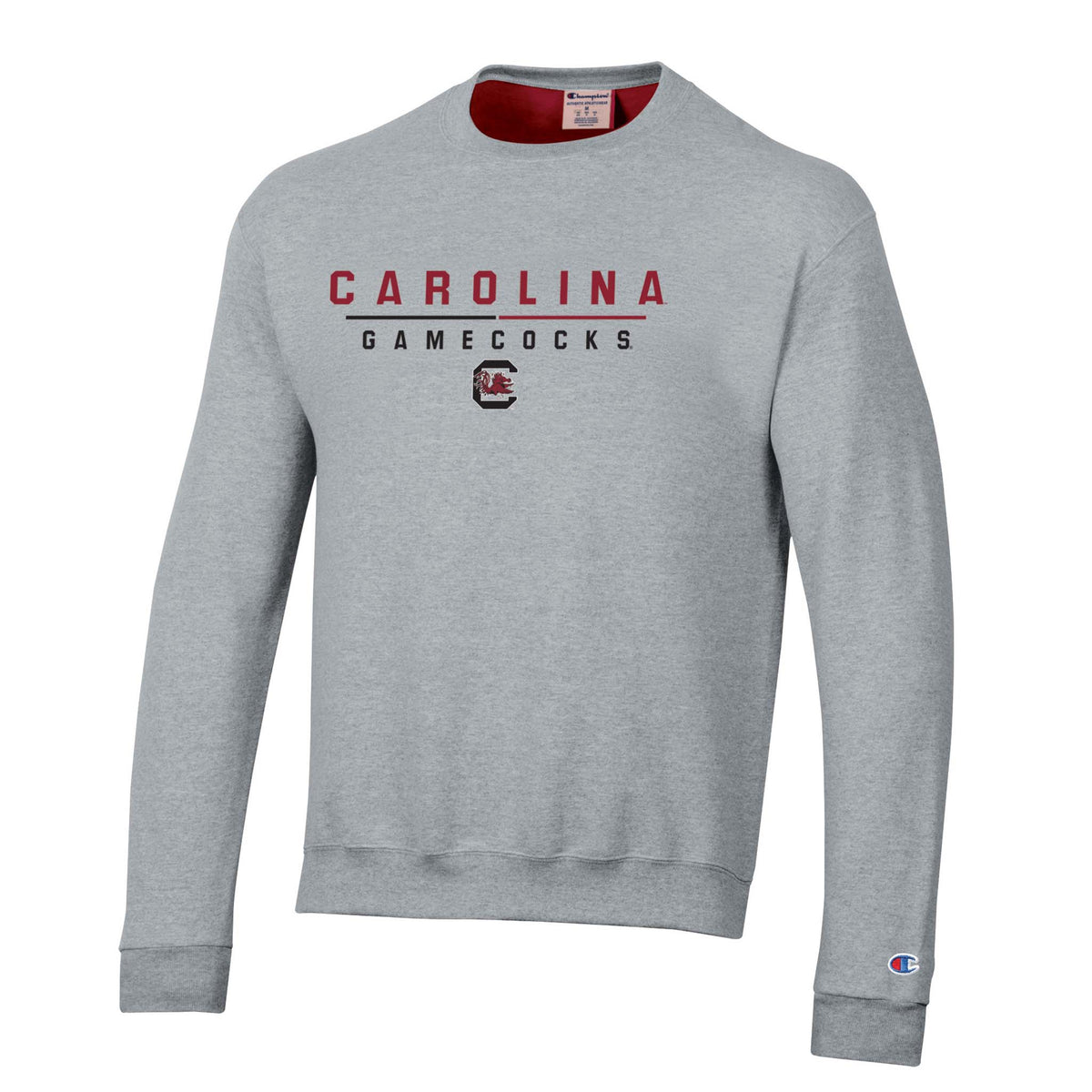 Grey Champion crewneck sweatshirt with “Carolina Gamecocks” text and Gamecocks logo, finished with Champion “C” logo on sleeve.