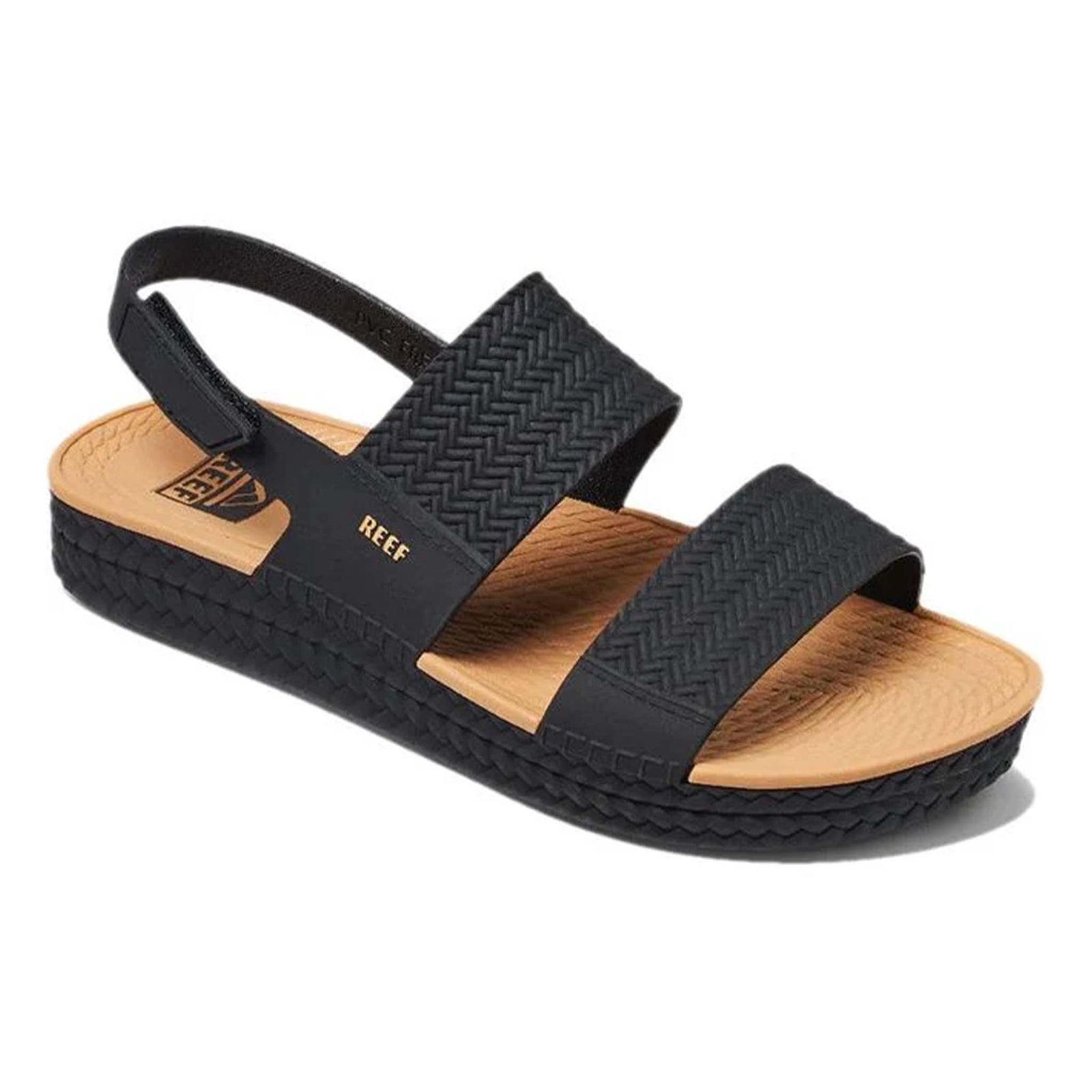 Reef Women's Water Vista Sandals in Black, sizes 6, 7, 8, 9, 10. Angled front view of sandal highlighting contoured footbed and woven texture of straps.