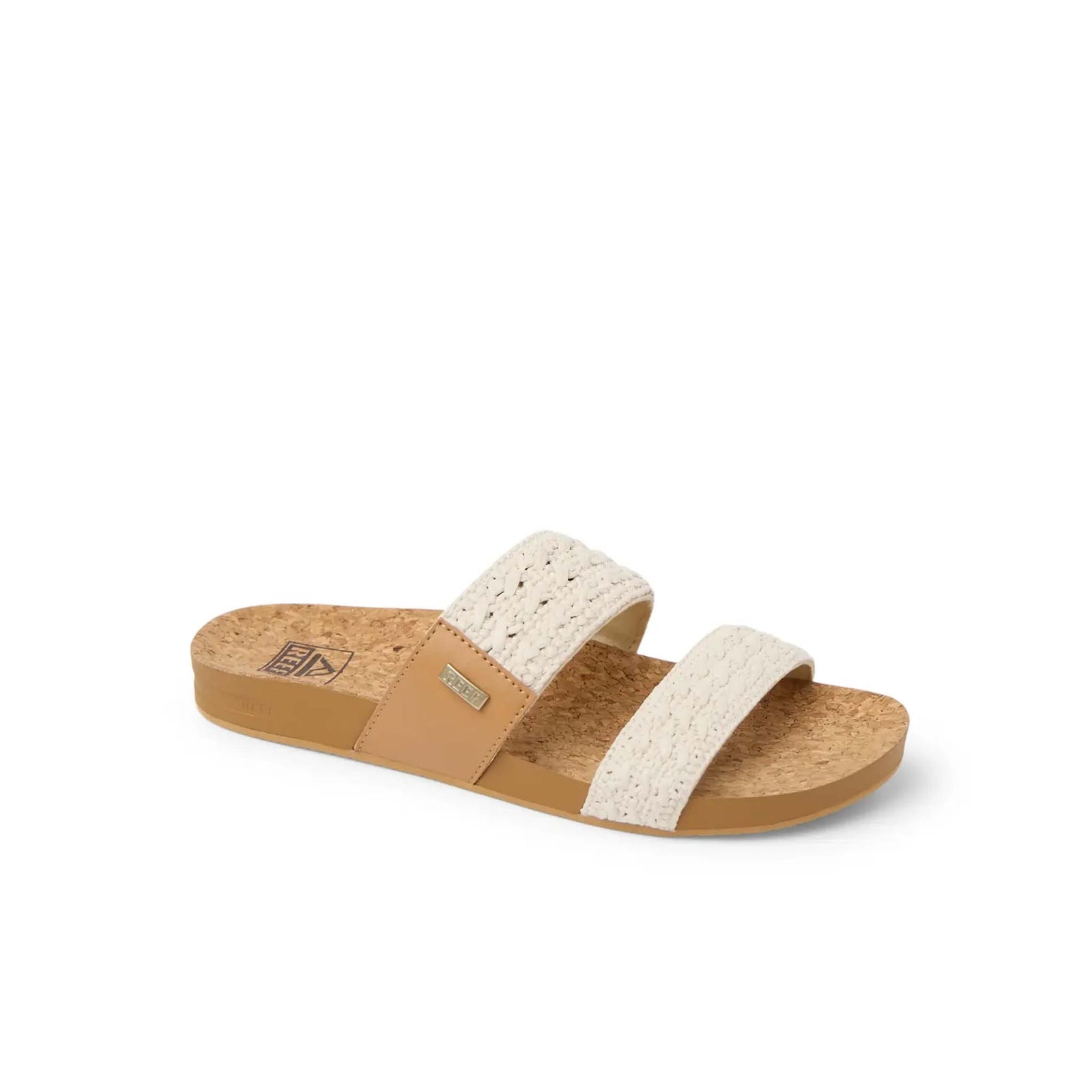 Beige sandal with woven strap on a white background