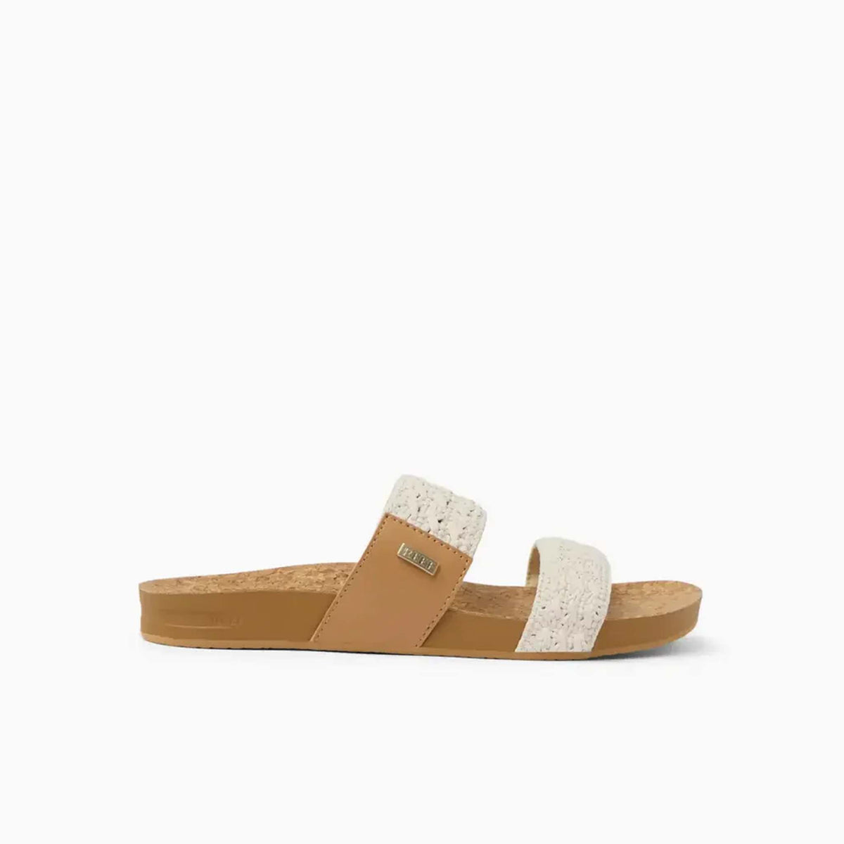 Tan sandal with white straps on a white background