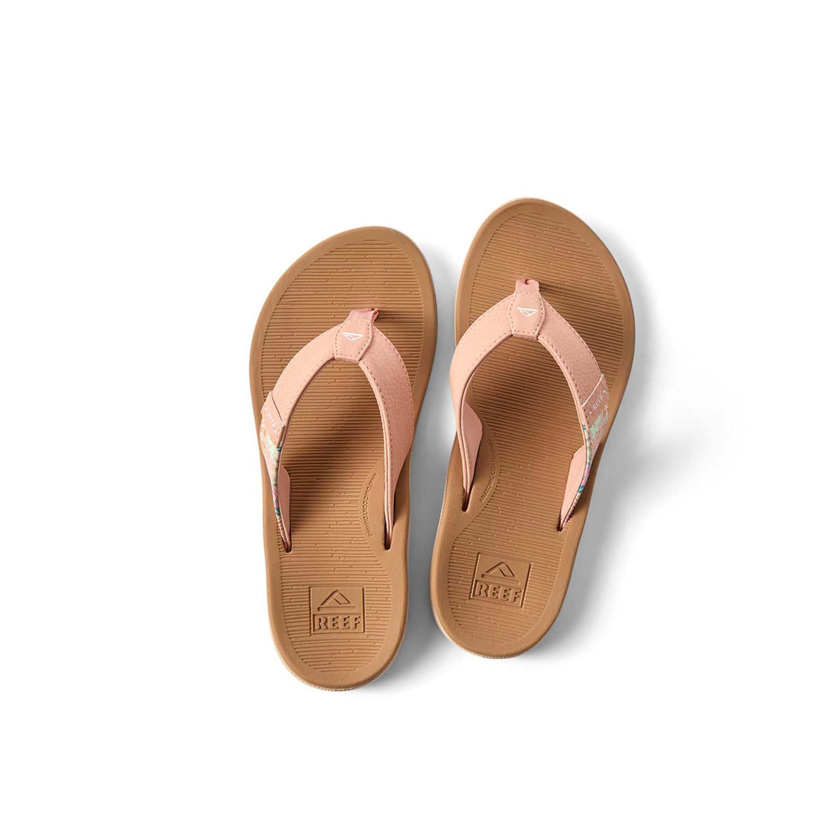 Pair of tan flip-flops with pink straps on a white background