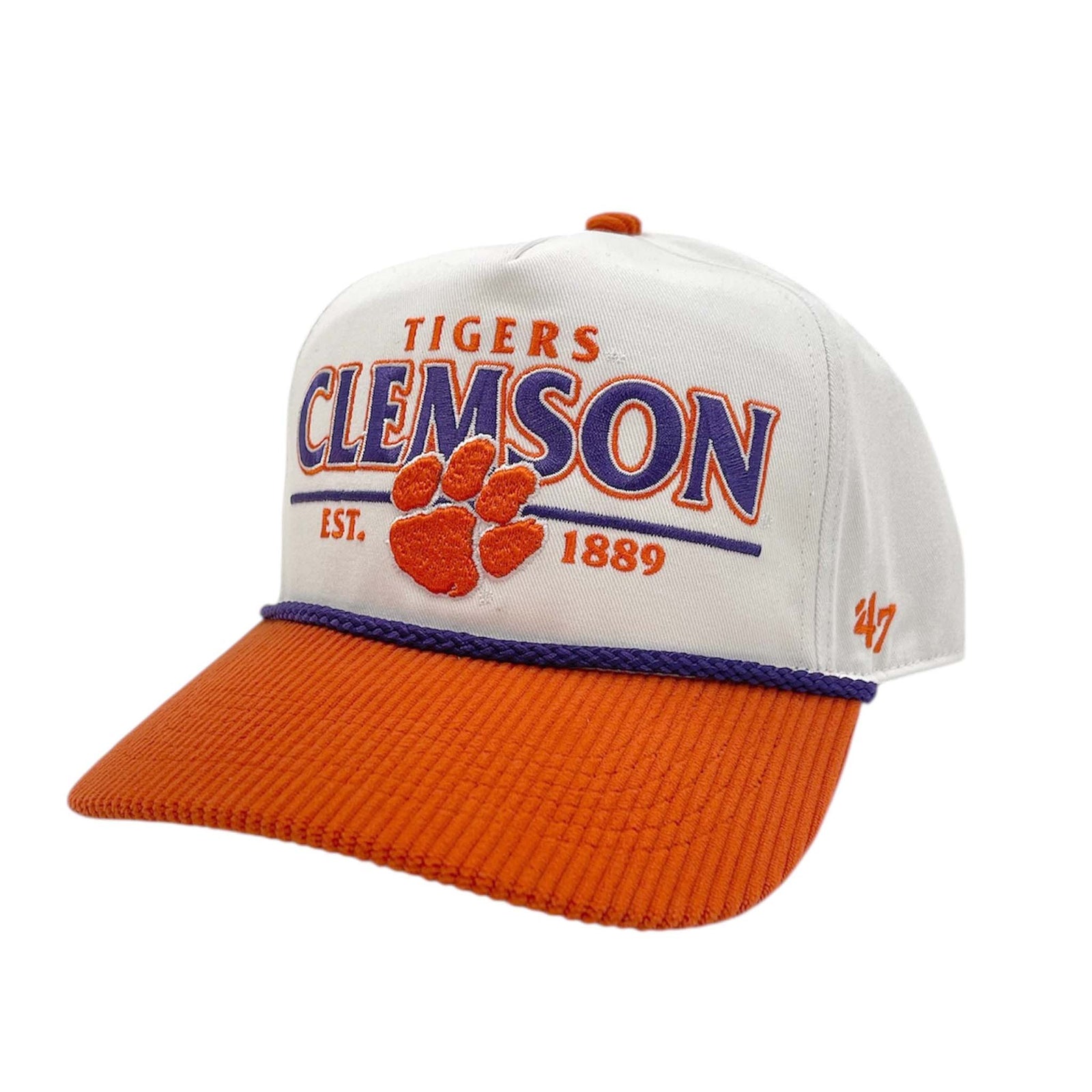 47 Brand Clemson Rustic Hitch, adjustable plastic snapback.
White and orange Clemson Tigers baseball cap with a structured crown and corduroy-textured orange bill. Features embroidered text "TIGERS CLEMSON EST. 1889" with an orange tiger paw logo on the front, a purple accent rope above the brim, and an orange "’47" logo stitched on the side.