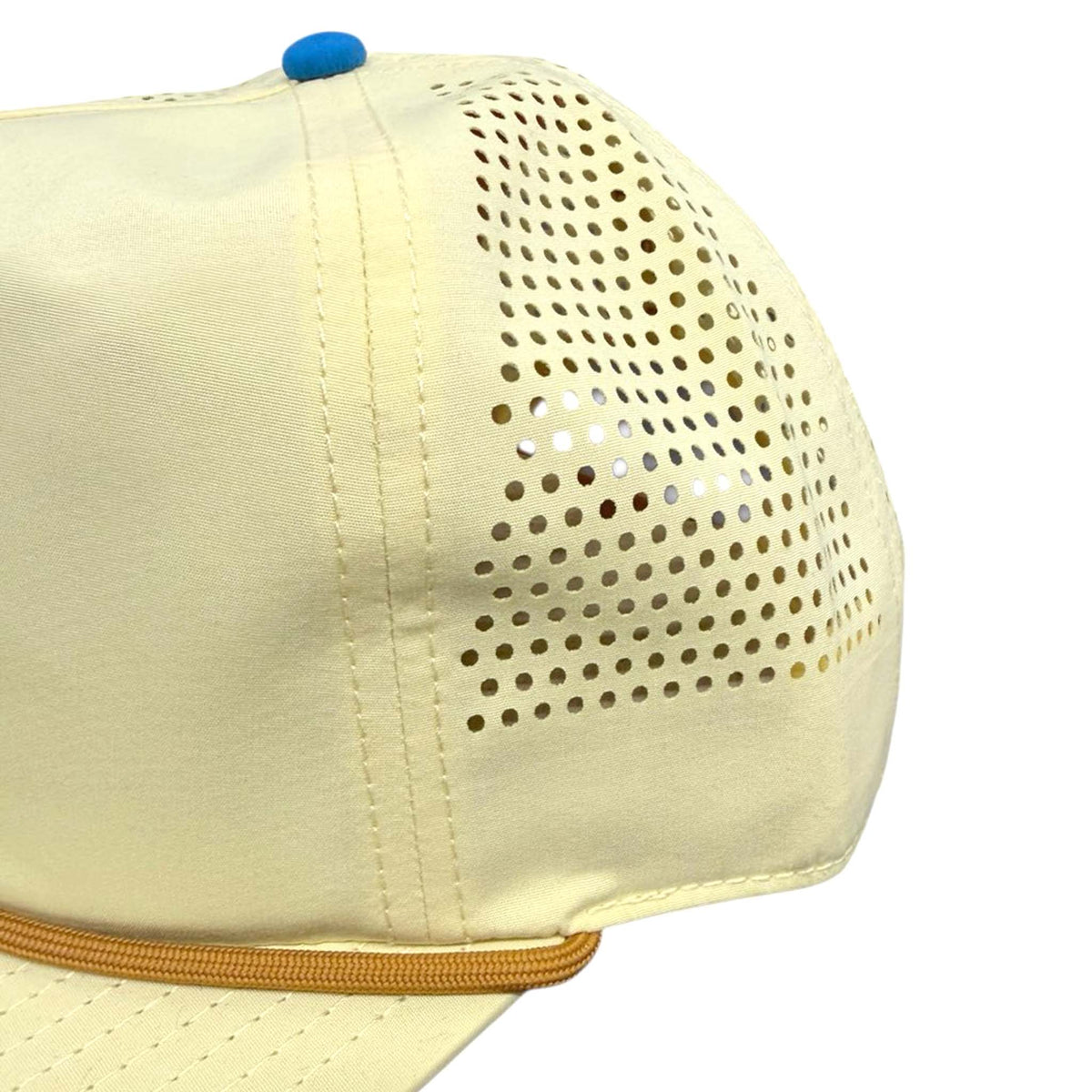 Lightweight yellow cap with breathable perforations and flat brim, close-up side view