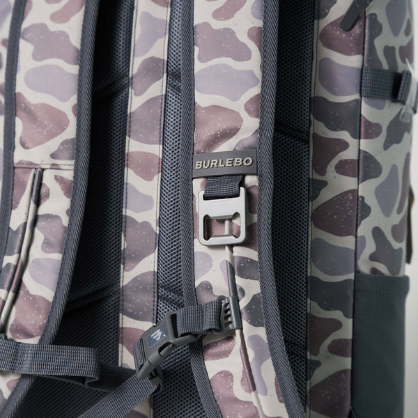 Burlebo Classic Deer Camo Cooler Backpack back panel with padded shoulder straps and adjustable chest buckle.