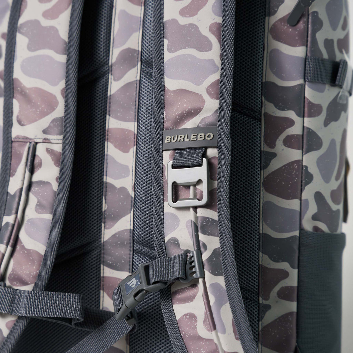Burlebo Classic Deer Camo Cooler Backpack back panel with padded shoulder straps and adjustable chest buckle.