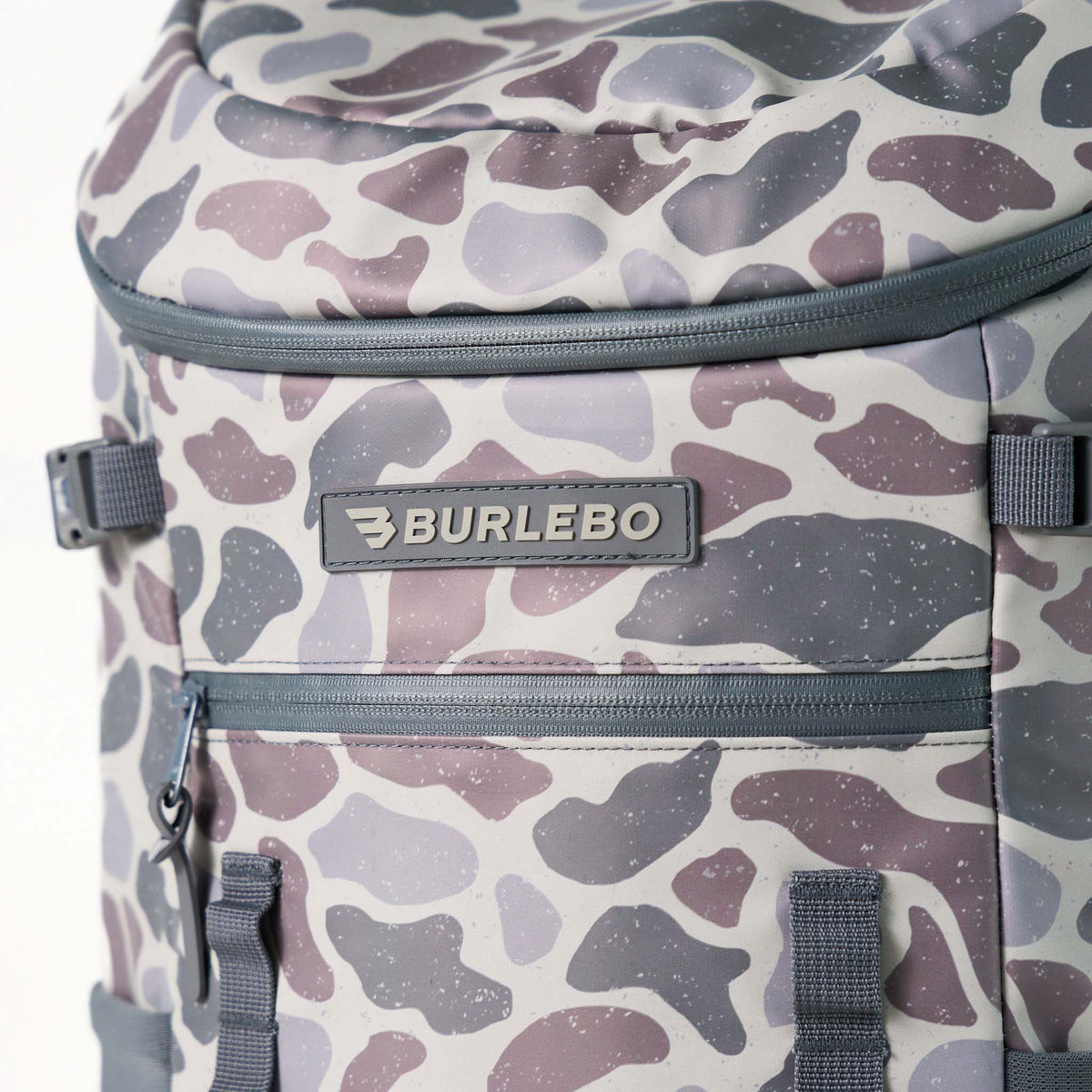 Burlebo Classic Deer Camo Cooler Backpack front view with zippered pocket, logo patch, and gray camo pattern.