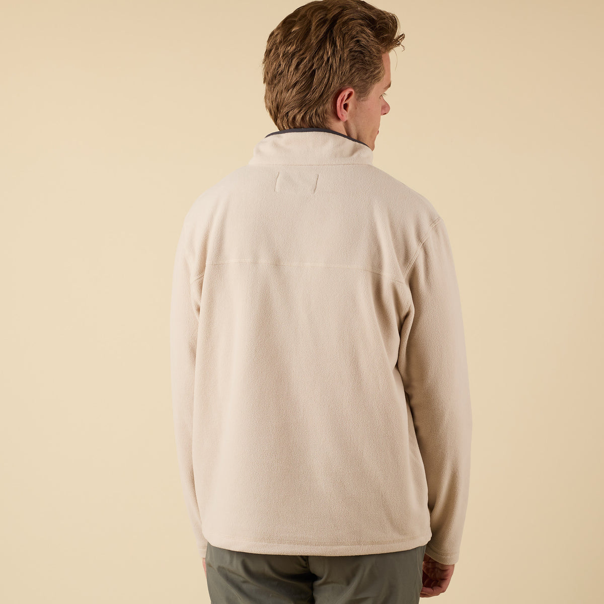 Back view of Crosby Fleece Quarter Snap Pullover in oatmeal showing smooth fleece texture and relaxed fit.