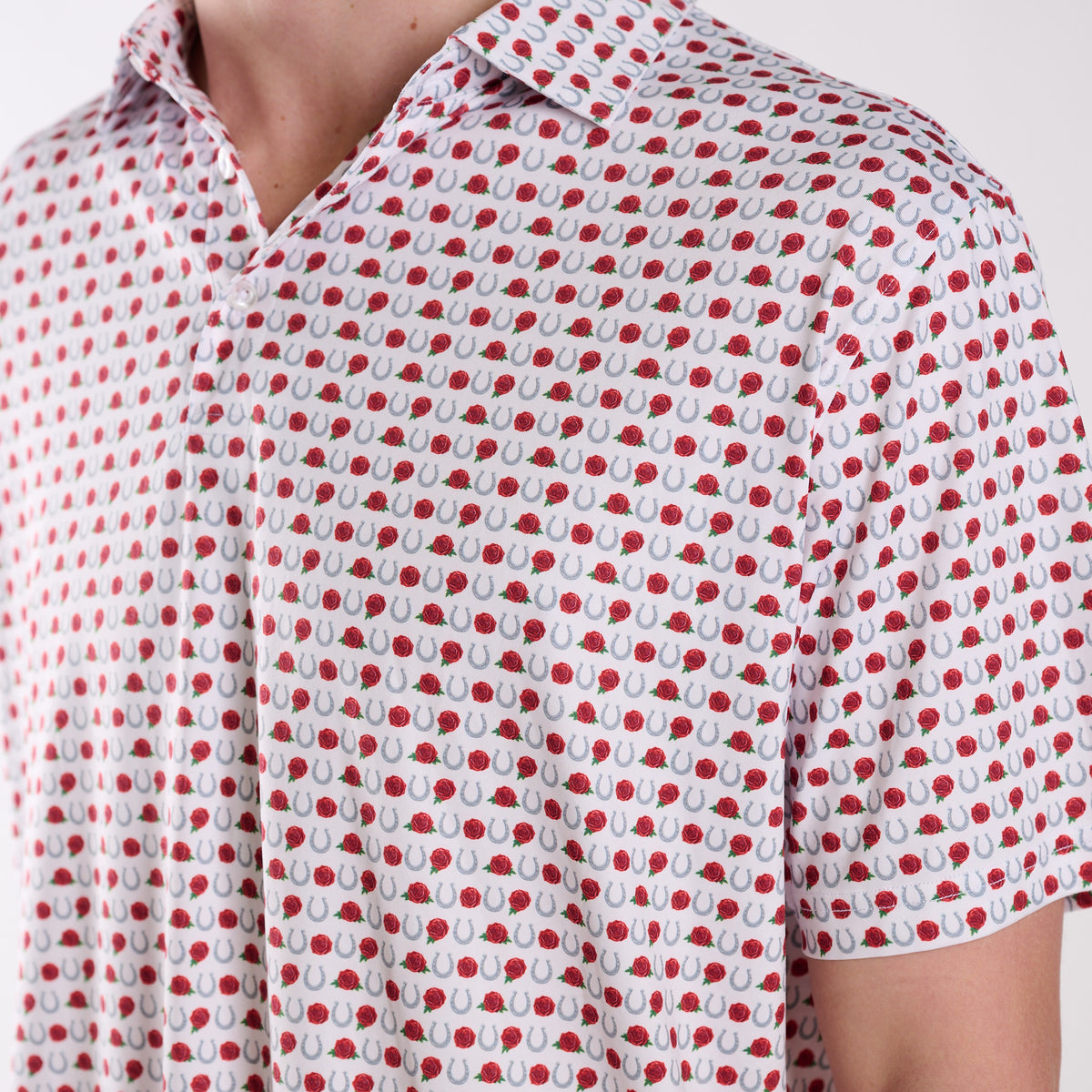 Close-up of a red and white patterned polo
