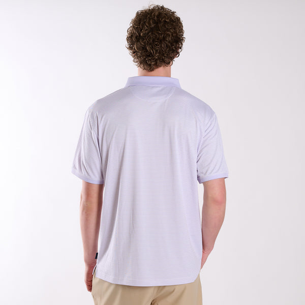 Full back view of COAST micro-stripe performance polo in light lavender with white stripes, paired with khaki shorts.