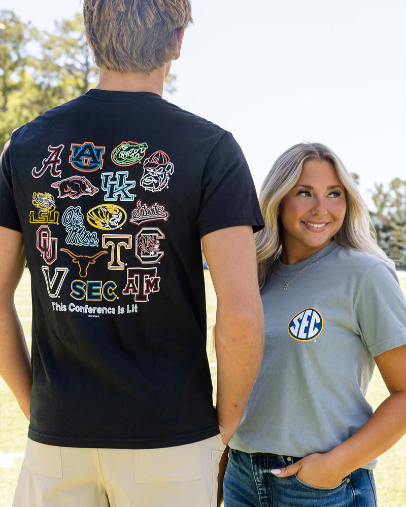 Man and woman modeling SEC t-shirts.