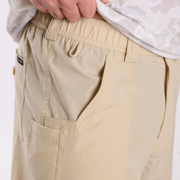 Close up of utility pockets on Local Boy Outfitters Chum shorts in light khaki