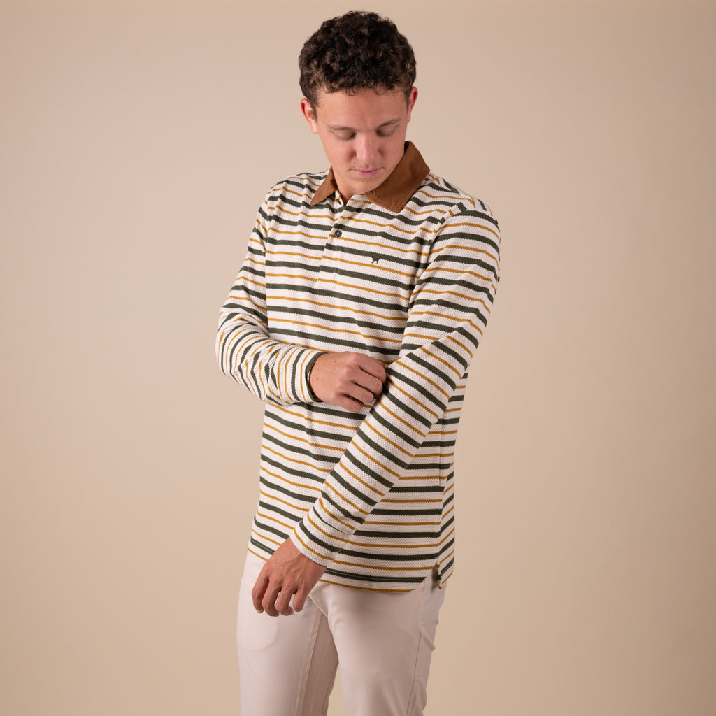 Man wearing a striped shirt with a brown collar against a beige background