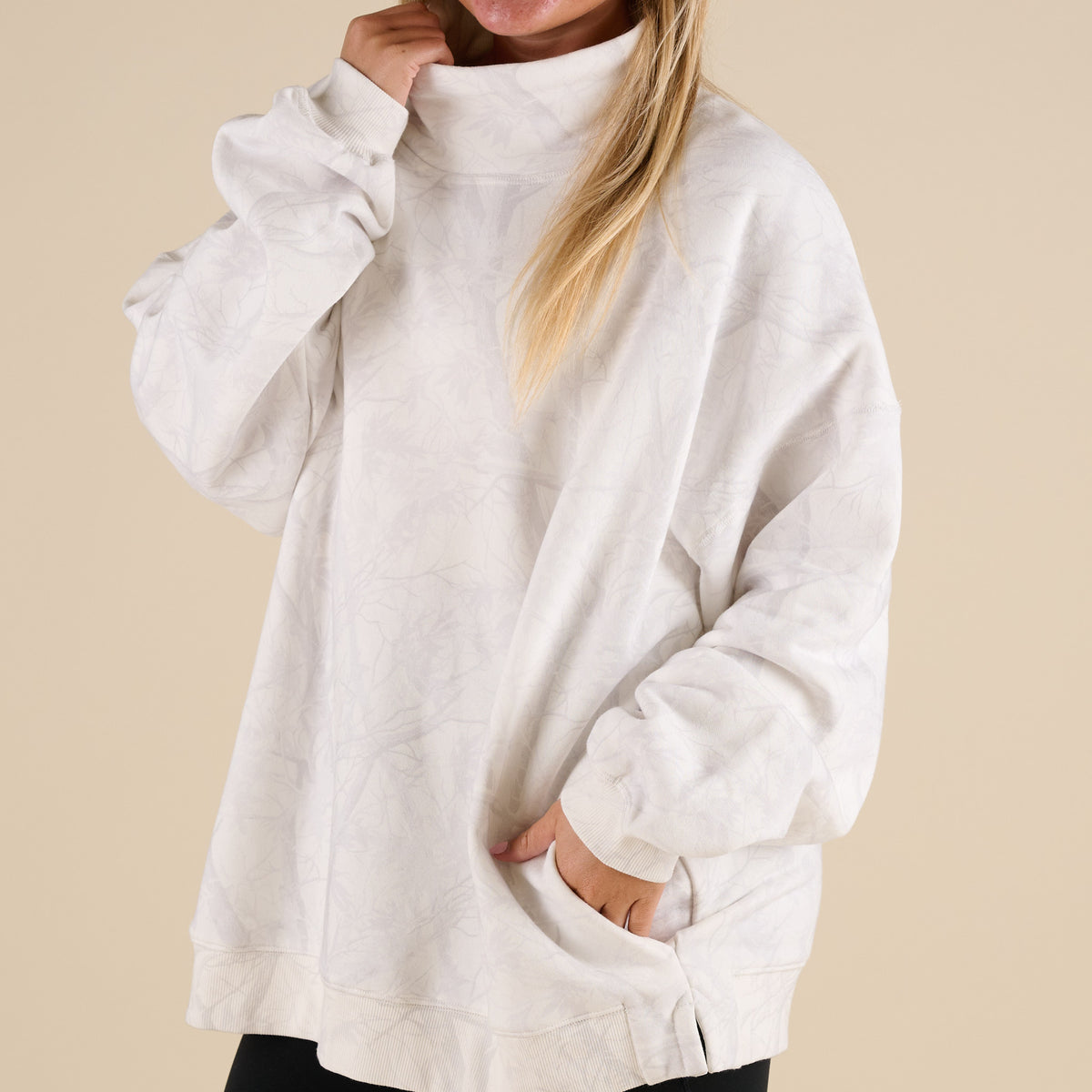 Love Bug Apparel Woodlands Camo Mock Neck Sweatshirt with side pockets and light gray and white camo print