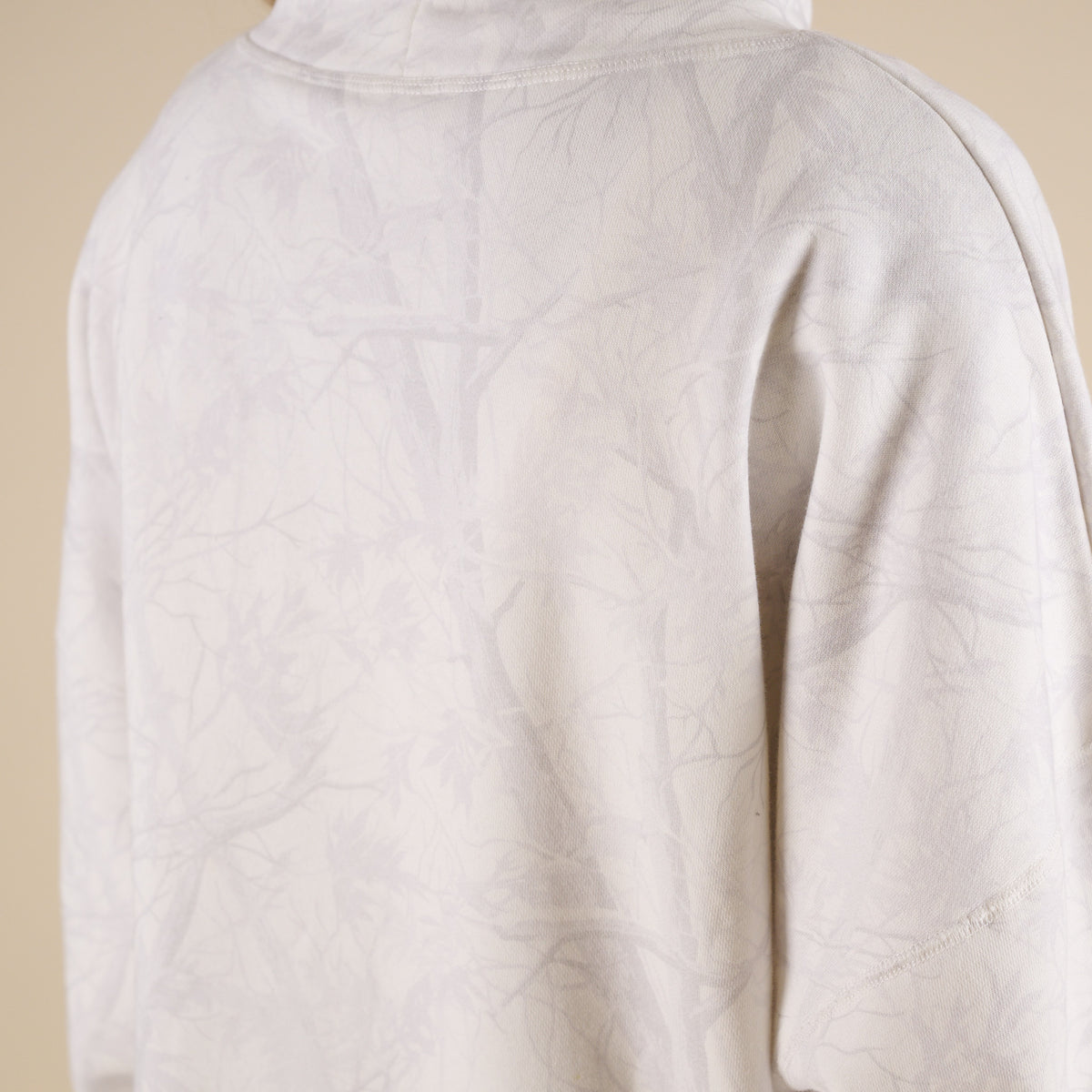 Love Bug Apparel Woodlands Camo Mock Neck Sweatshirt with side pockets and light gray and white camo print