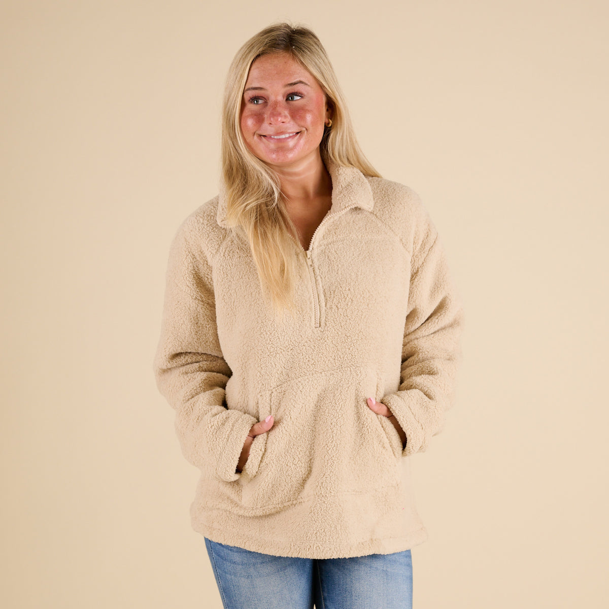 Blu Pepper 1/4 Zip Fleece Pullover in Natural with soft sherpa texture, stand collar, front kangaroo pocket, and relaxed fit shown on model.