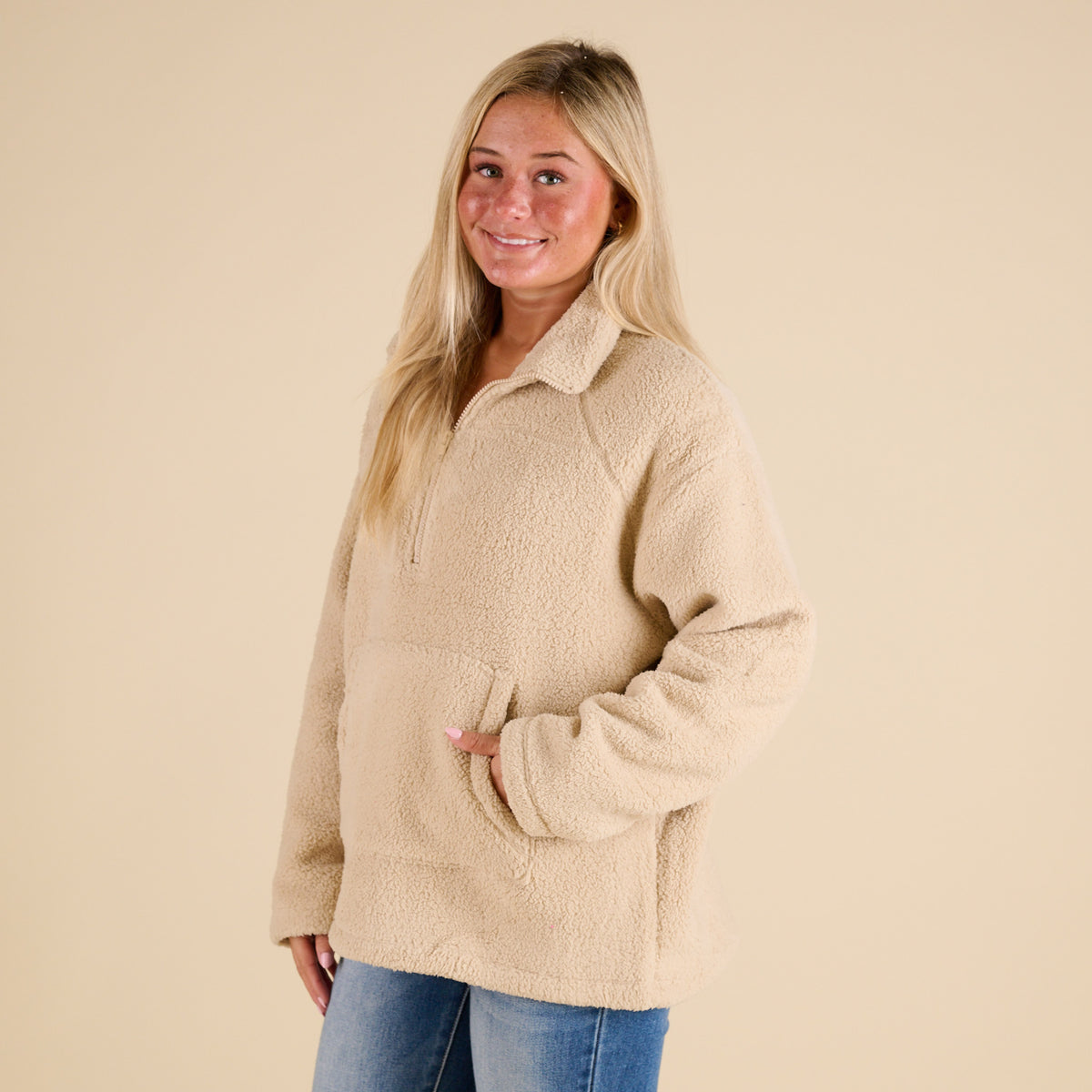 Blu Pepper 1/4 Zip Fleece Pullover in Natural with soft sherpa texture, stand collar, front kangaroo pocket, and relaxed fit shown on model.
