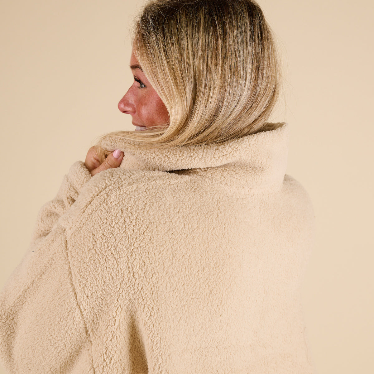 Blu Pepper 1/4 Zip Fleece Pullover in Natural with soft sherpa texture, stand collar, front kangaroo pocket, and relaxed fit shown on model.