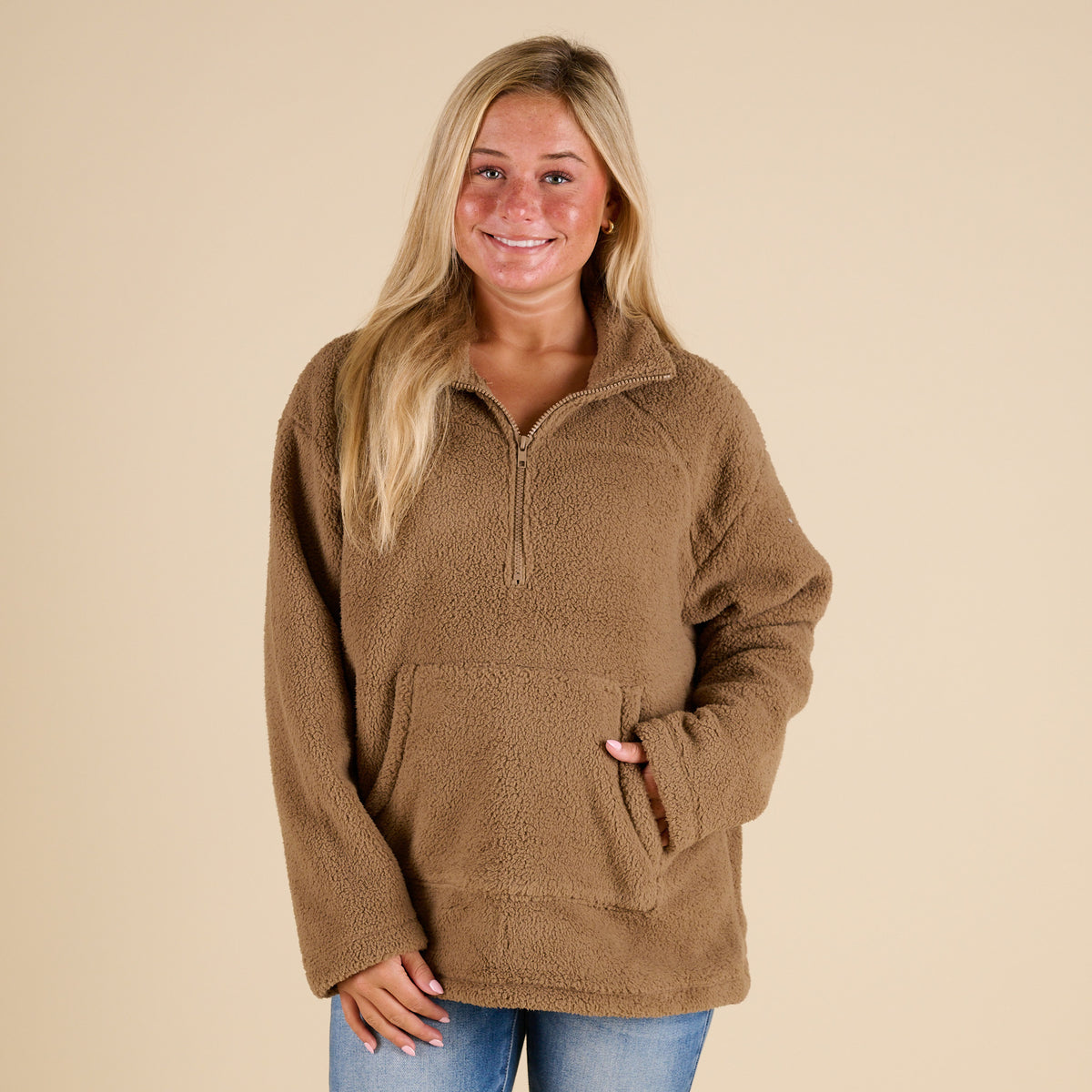 Blu Pepper 1/4 Zip Fleece Pullover in Mocha with soft sherpa texture, stand collar, front kangaroo pocket, and relaxed fit shown on model.