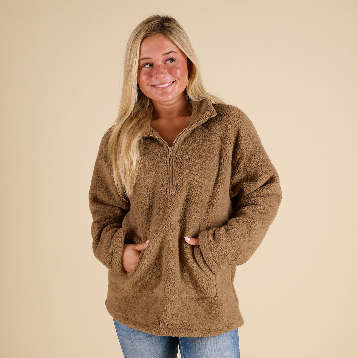 Blu Pepper 1/4 Zip Fleece Pullover in Mocha with soft sherpa texture, stand collar, front kangaroo pocket, and relaxed fit shown on model.
