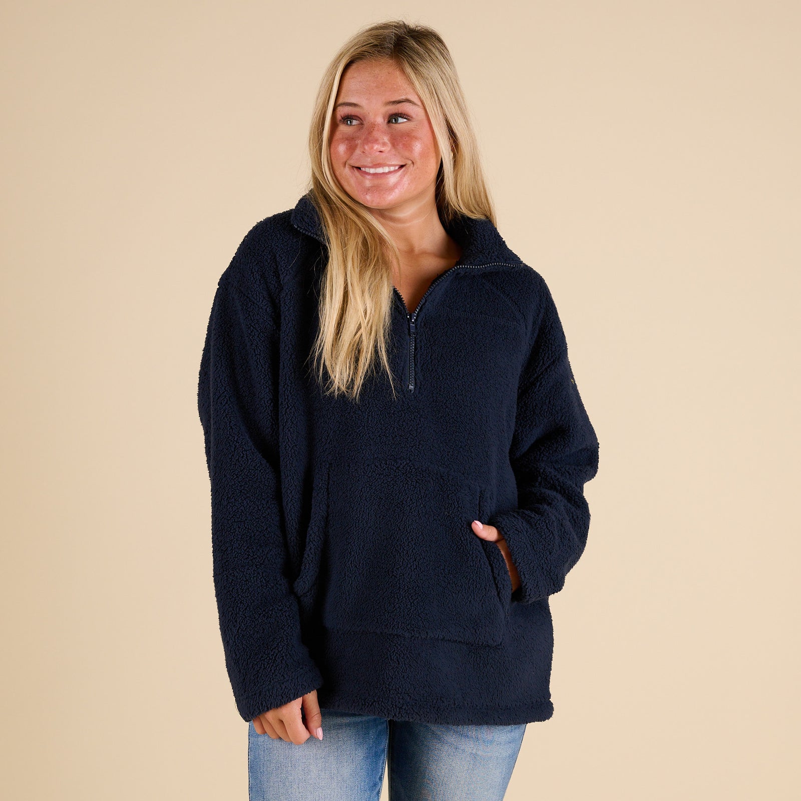 Blu Pepper 1/4 Zip Fleece Pullover in Navy with soft sherpa texture, stand collar, front kangaroo pocket, and relaxed fit shown on model.