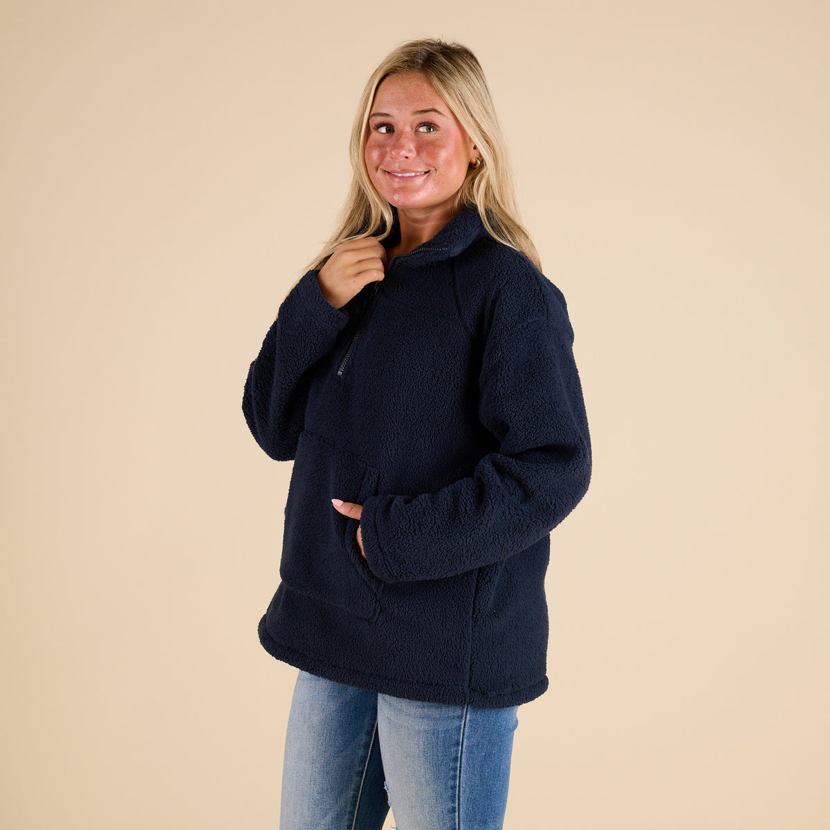 Blu Pepper 1/4 Zip Fleece Pullover in Navy with soft sherpa texture, stand collar, front kangaroo pocket, and relaxed fit shown on model.