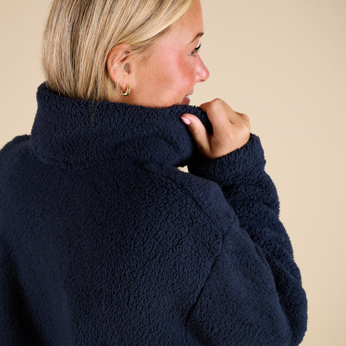 Blu Pepper 1/4 Zip Fleece Pullover in Navy with soft sherpa texture, stand collar, front kangaroo pocket, and relaxed fit shown on model.