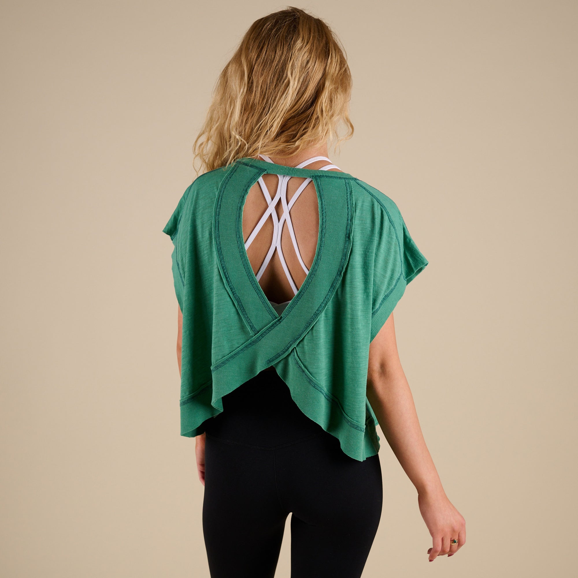 FP Movement My Time Tee in Heritage Green shown on model in studio