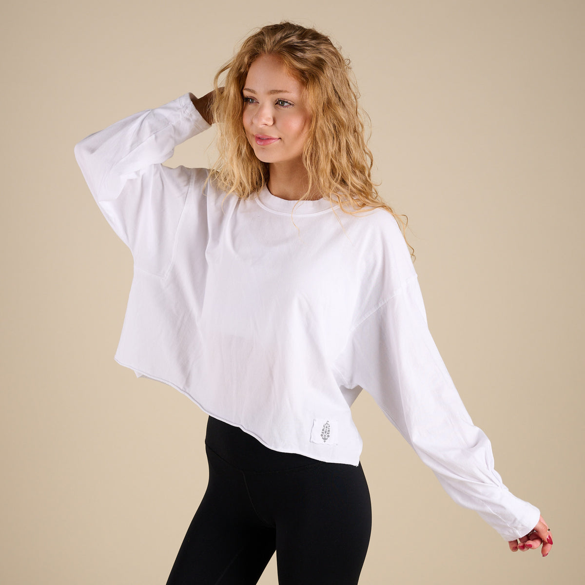 FP Movement Long Sleeve Inspire Layer in White shown on model in studio