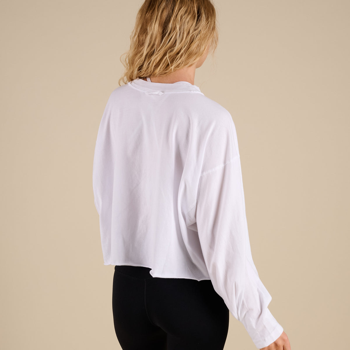 FP Movement Long Sleeve Inspire Layer in White shown on model in studio