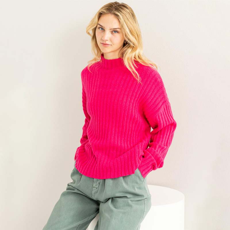 woman wearing pink sweater