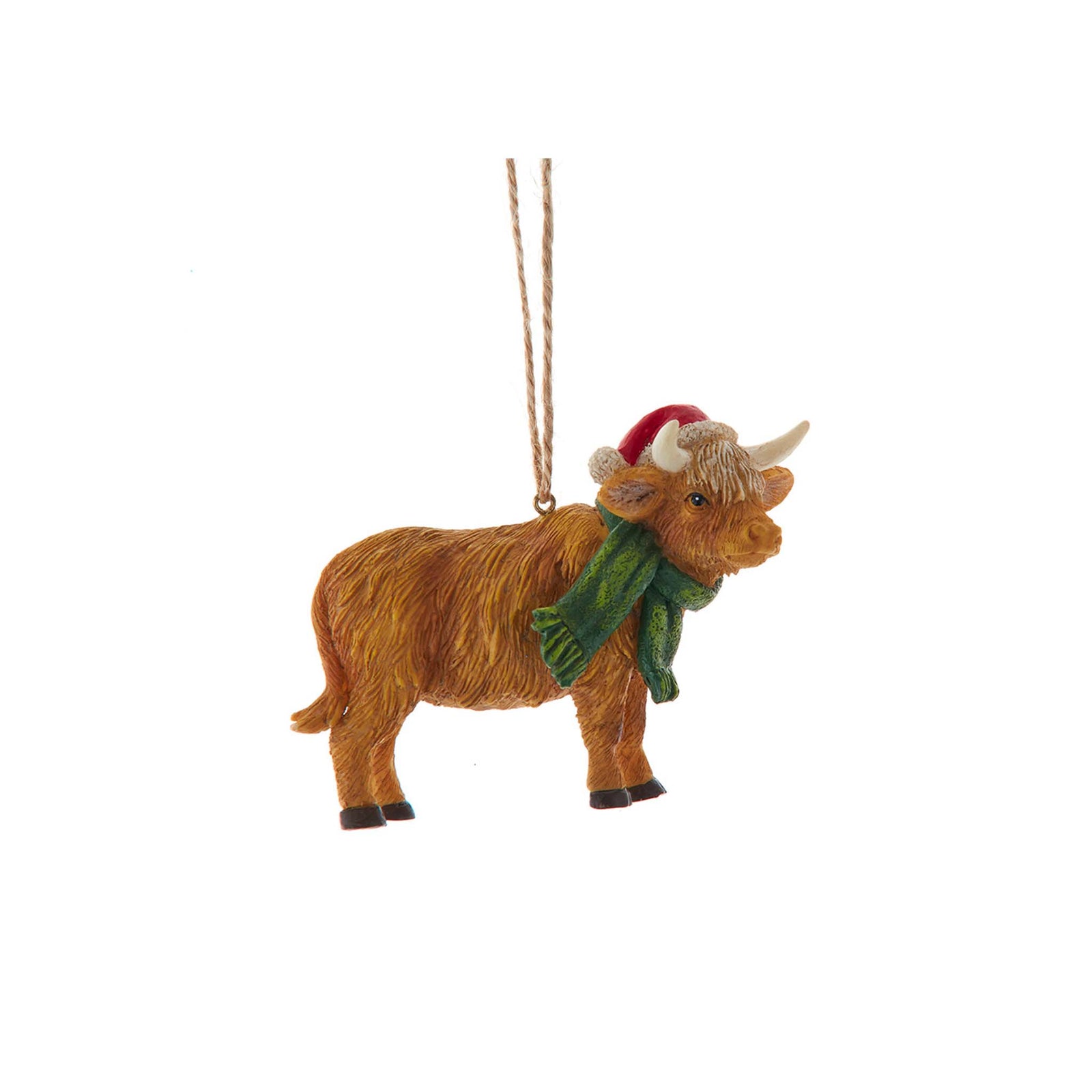 Highland cow Christmas ornament wearing a green scarf and Santa hat, designed for rustic and farmhouse-style holiday décor.
