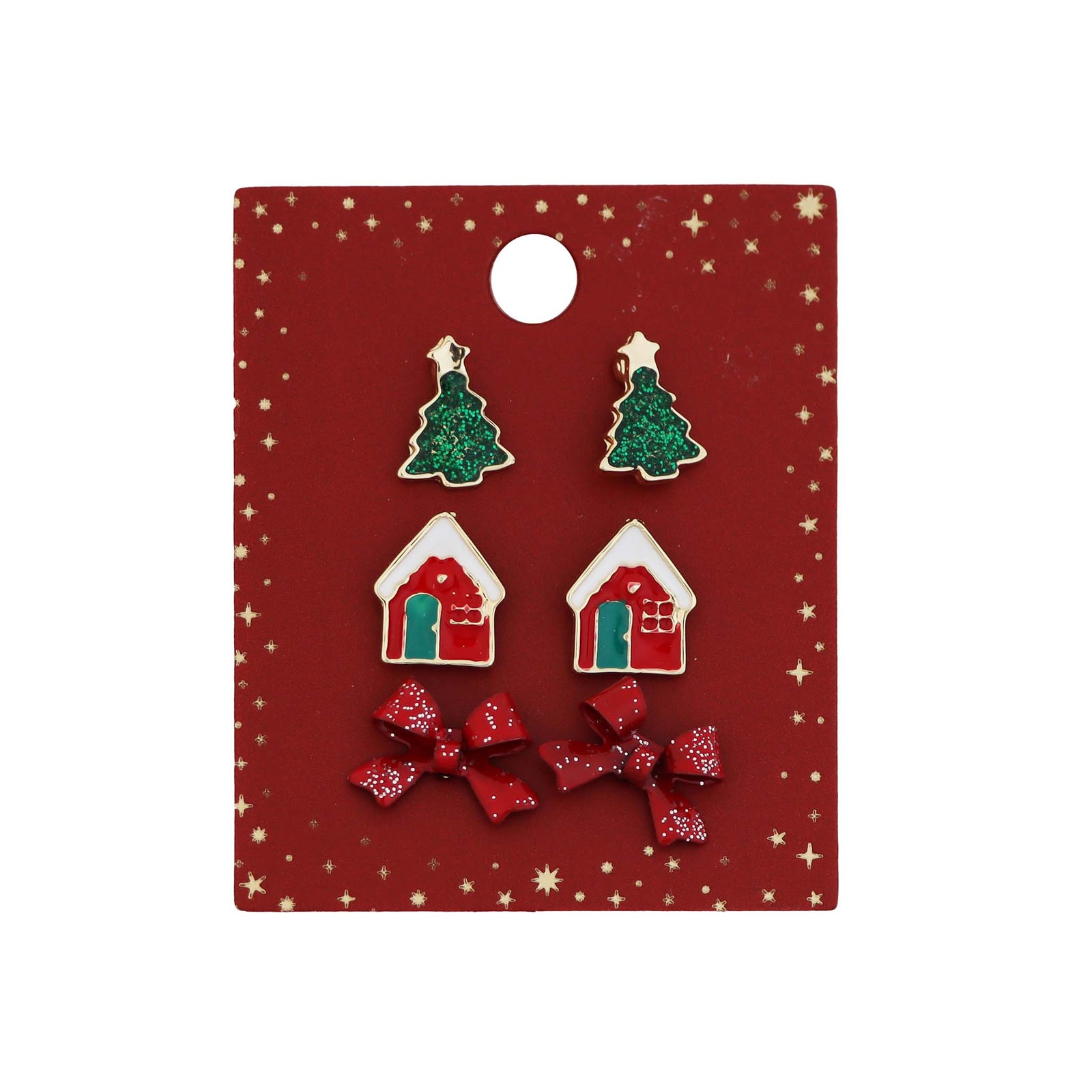 Pannee Group Christmas earring set with green glitter tree studs, red holiday house studs, and sparkly red bow studs on red starry display card.