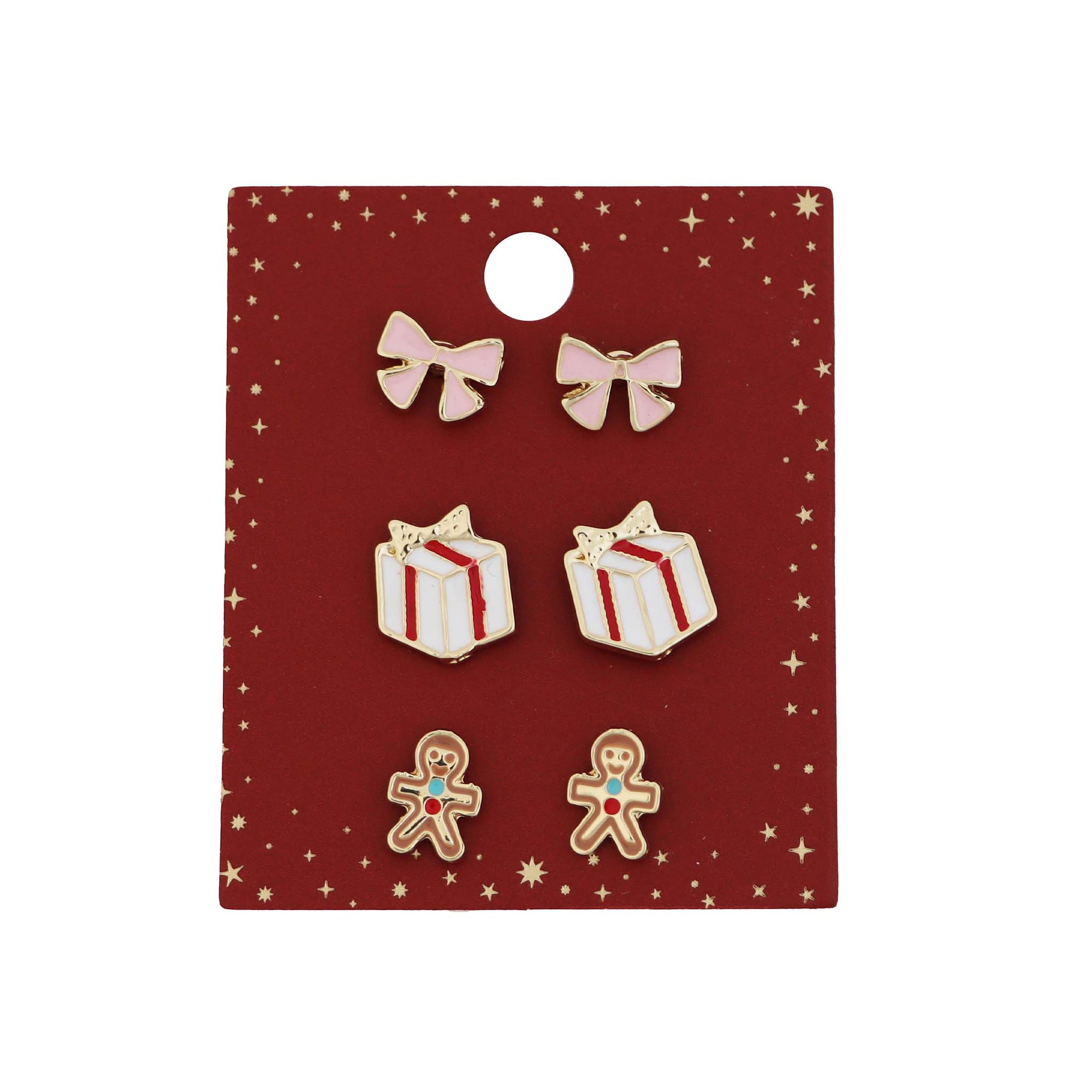 Pannee Group Christmas earring set featuring pink bow studs, red and white gift box studs, and gingerbread man studs on red starry display card.