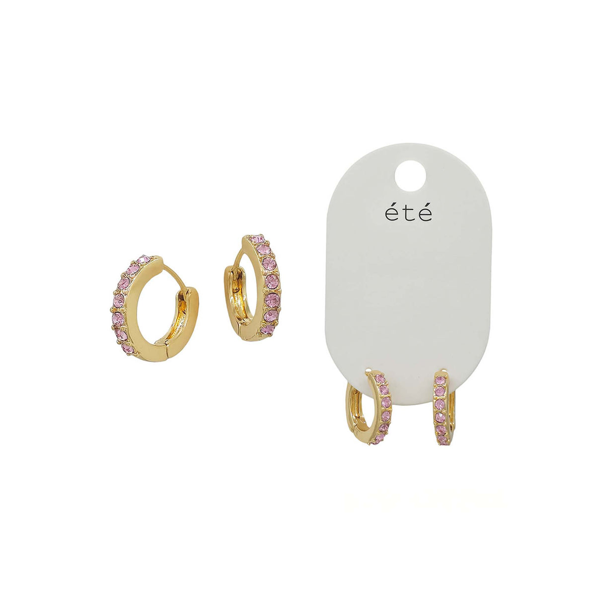 Gold hoop earrings with pink gemstones on a white background with 'éte' label.