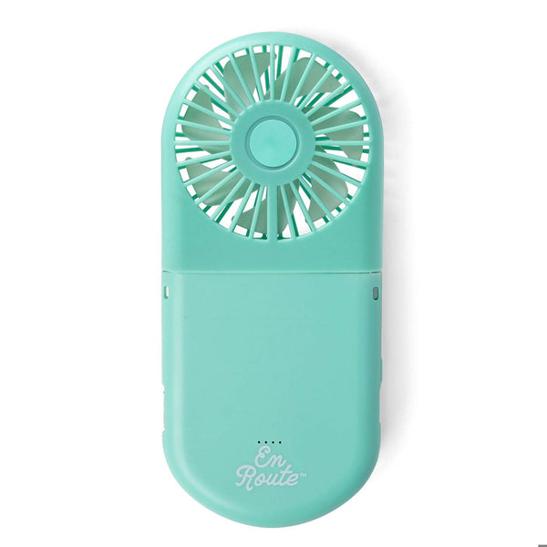 Turquoise handheld fan with 'En Route' text on a white background