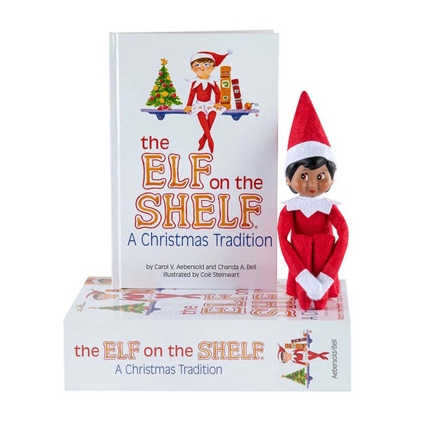 Brown eyed girl Elf on The Shelf doll with Christmas Tradition book.