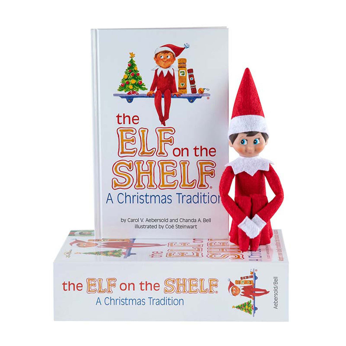 Elf on the shelf boy with blue eyes and Christmas Traditions book.