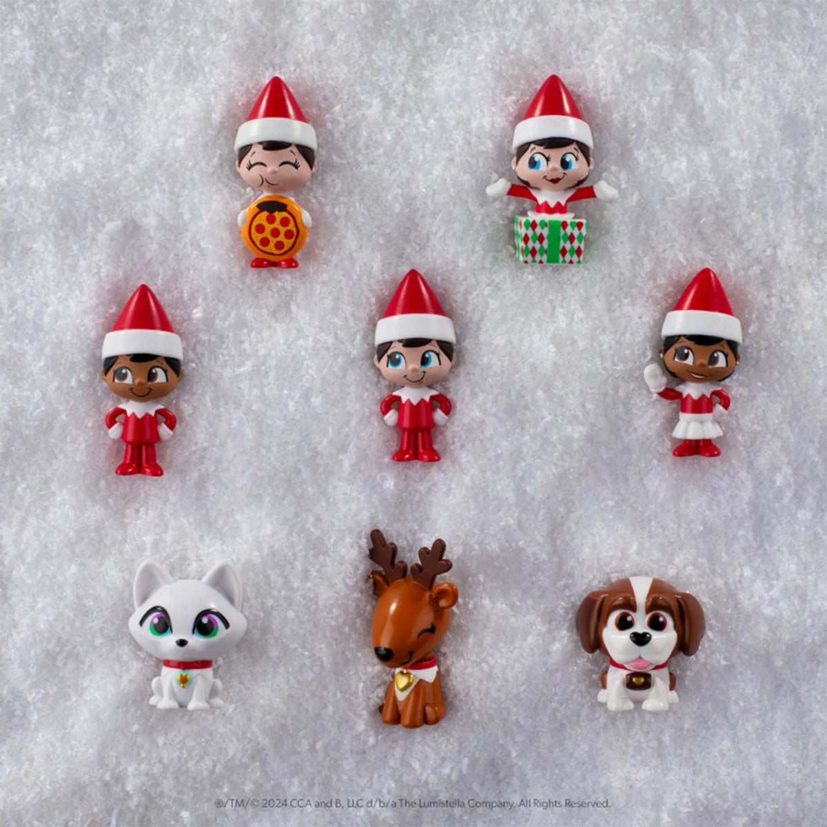 Set of Christmas-themed figurines on a textured white background
