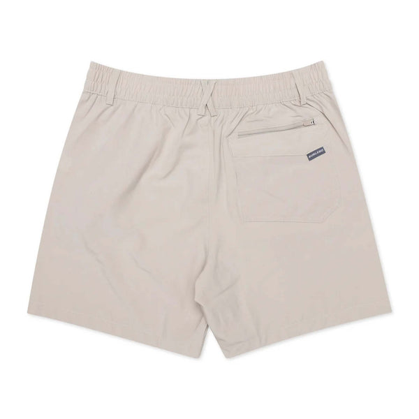 Back view of Burlebo men's light khaki hybrid shorts with elastic waistband, single back pocket, and logo tag.