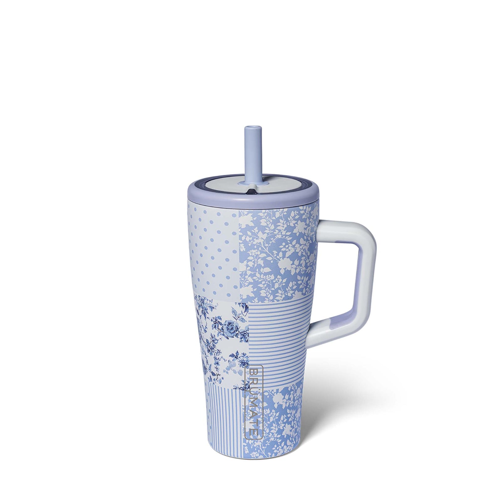 Blue floral-patterned mug with a straw on a white background