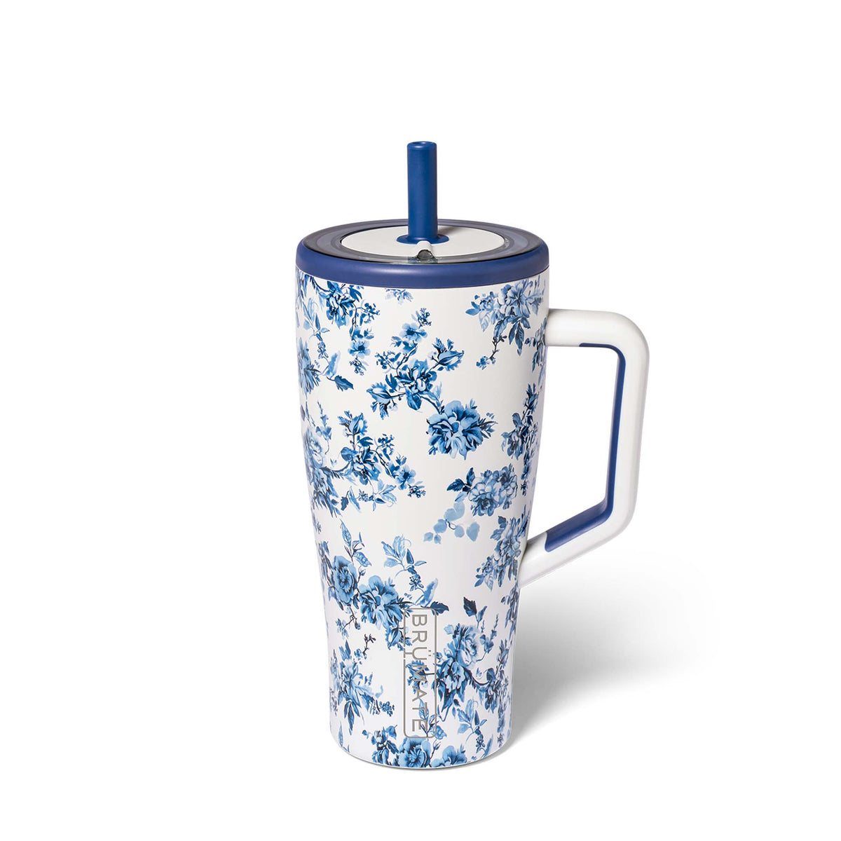 Blue floral-patterned handled tumbler with a straw on a white background
