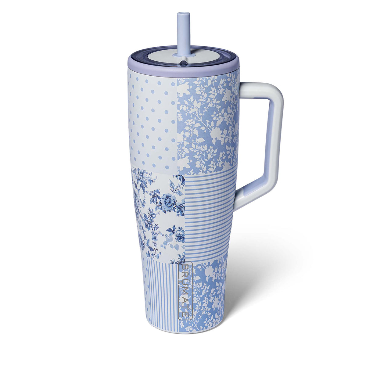 Tumbler with blue floral pattern on a white background