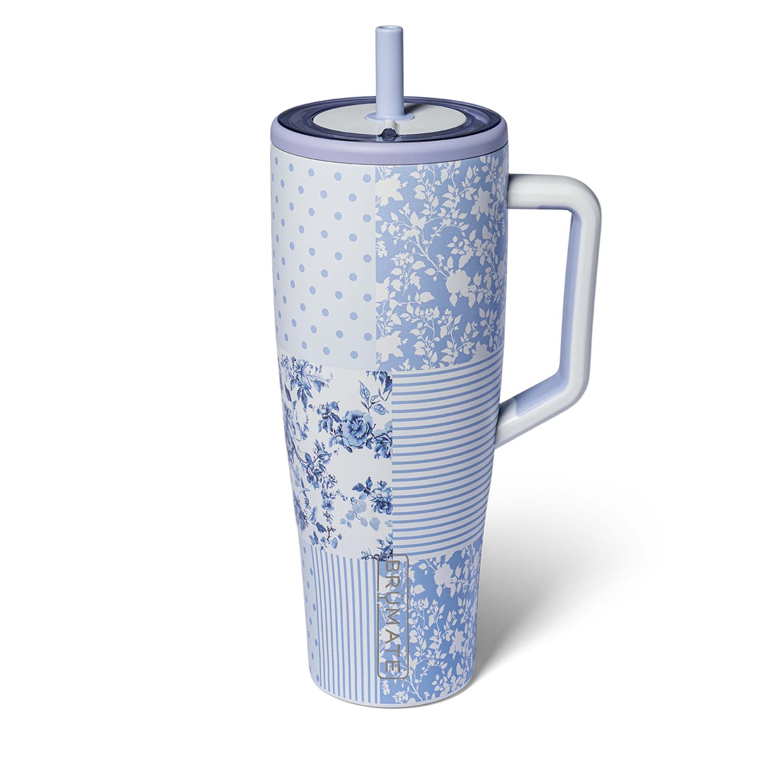 Tumbler with blue floral pattern on a white background