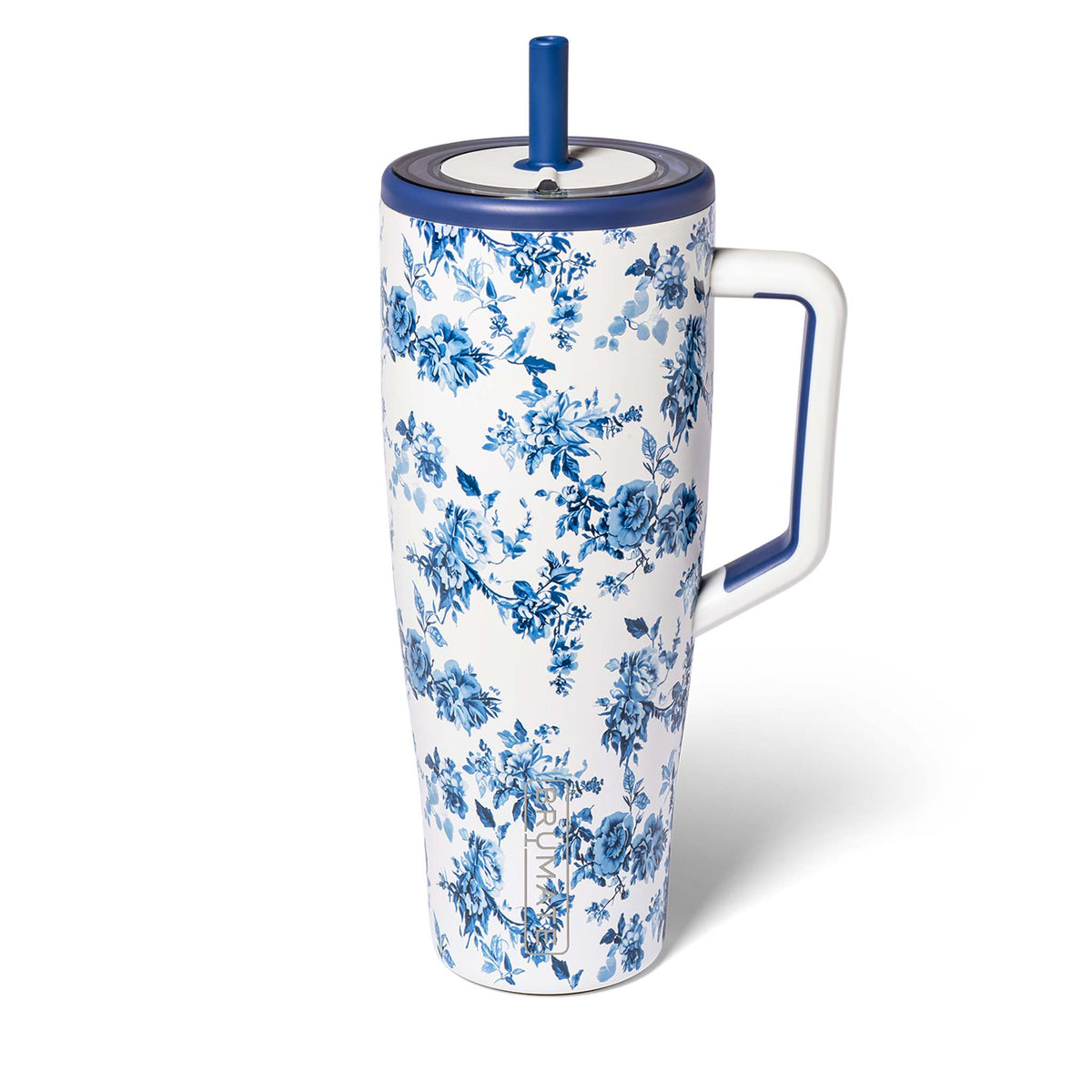 Floral-patterned handled tumbler with blue accents on a white background