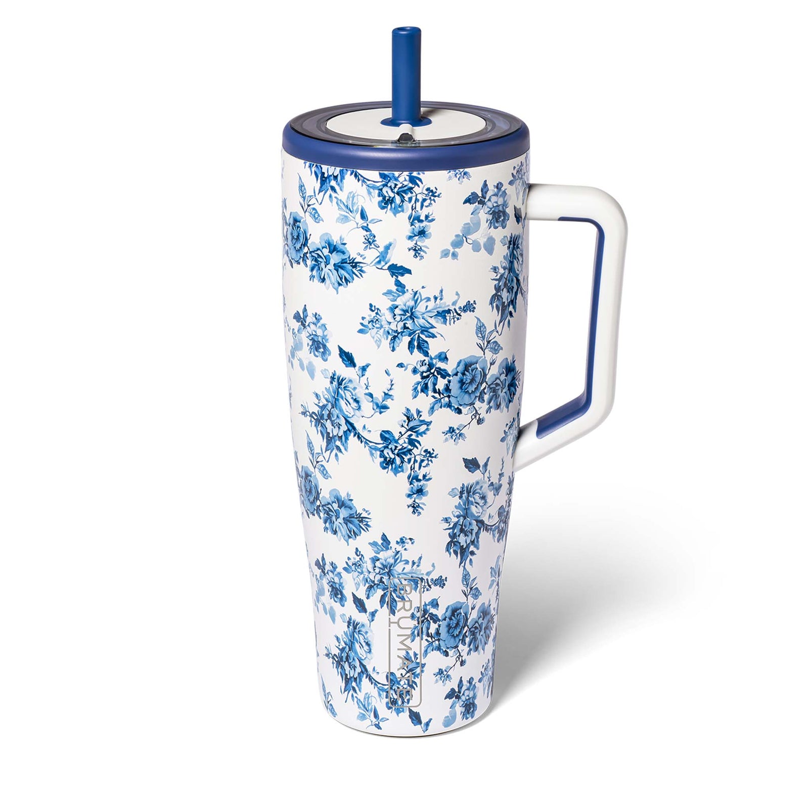 Floral-patterned handled tumbler with blue accents on a white background
