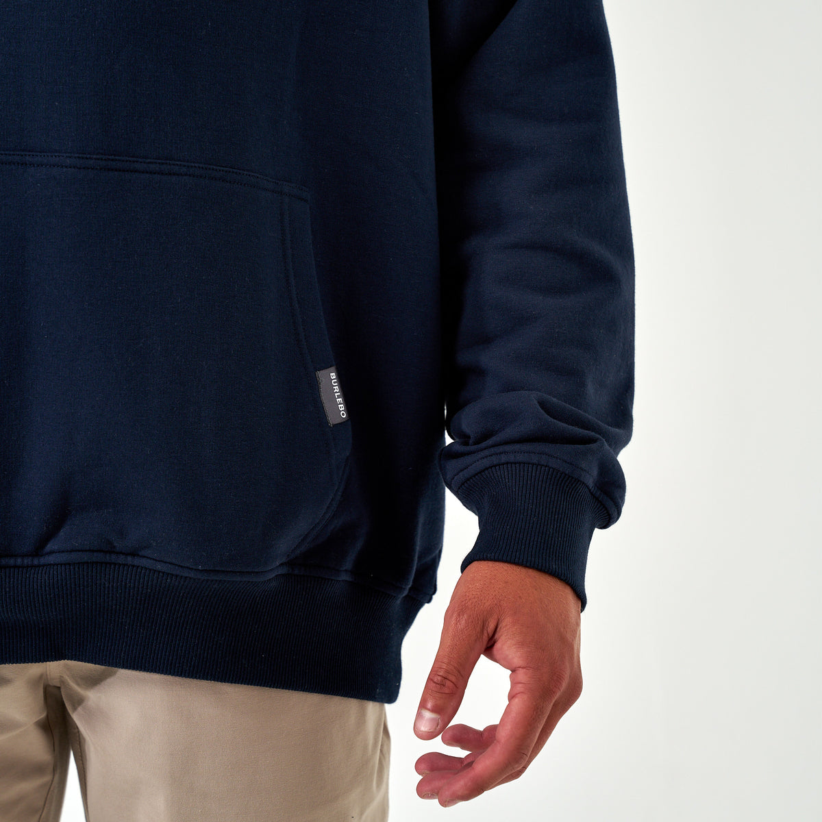 Burlebo Outdoors navy hoodie with large graphic featuring a flying duck over marsh grass, surrounded by bold red "Burlebo Outdoors" lettering.