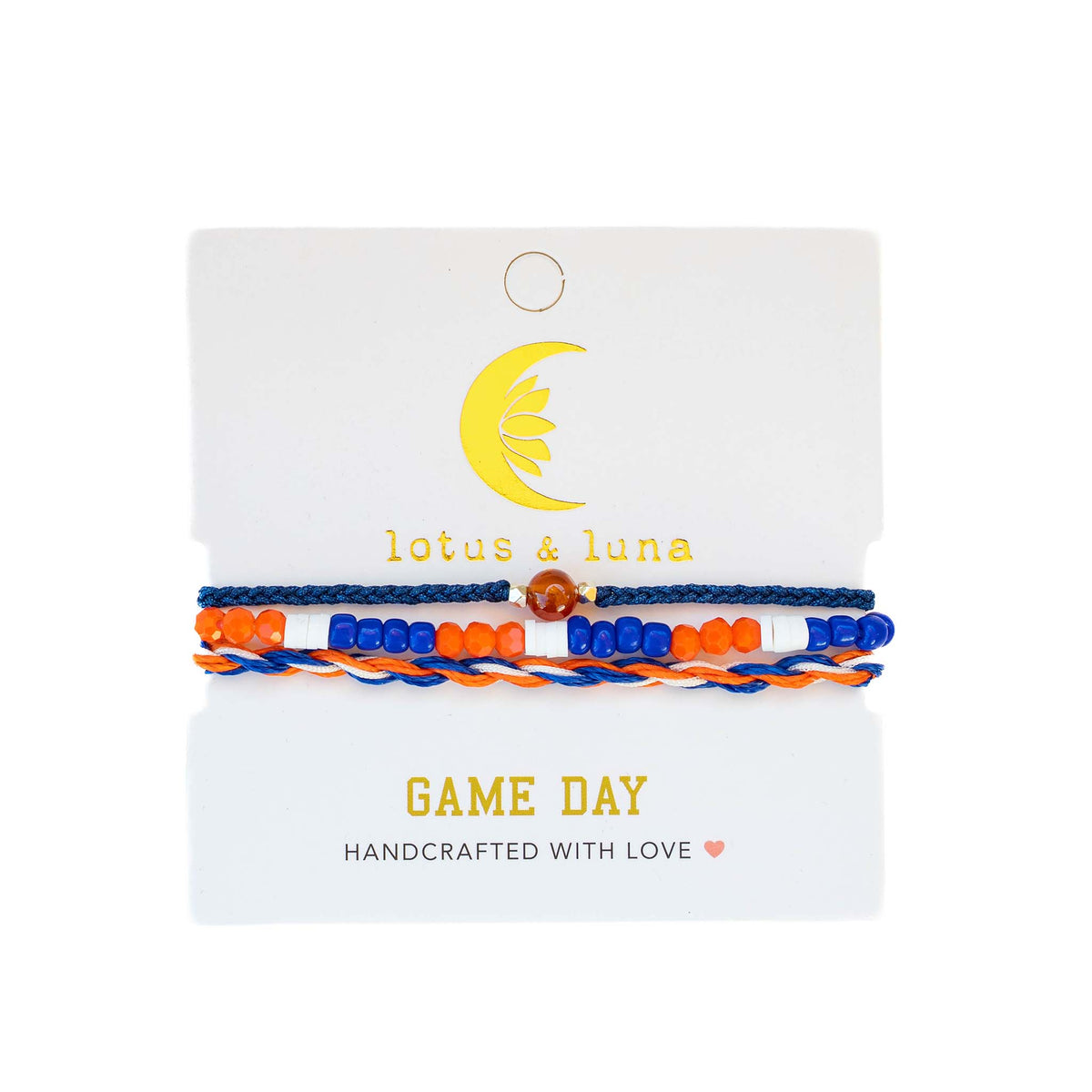 Lotus & Luna bracelet set in orange, blue, and white, with beaded center and twisted cord design on card labeled “Game Day.”